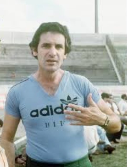A medalha para o treinador