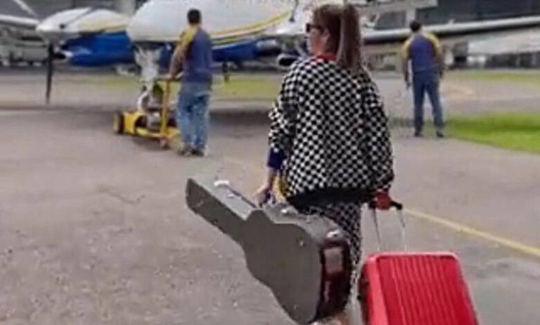 'Trocaria qualquer coisa não ter que ficar pegando avião", escreveu Marília Mendonça