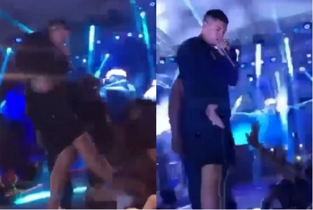 VÍDEO: Cantor joga e chuta fã para fora do palco durante show; ASSISTA