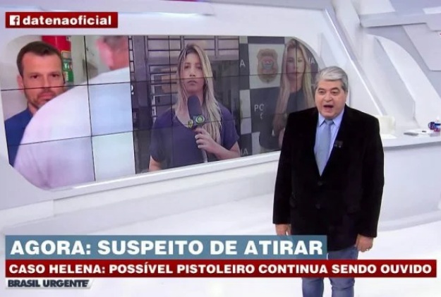 Homem passa na frente de câmera do Brasil Urgente ao vivo e irrita Datena