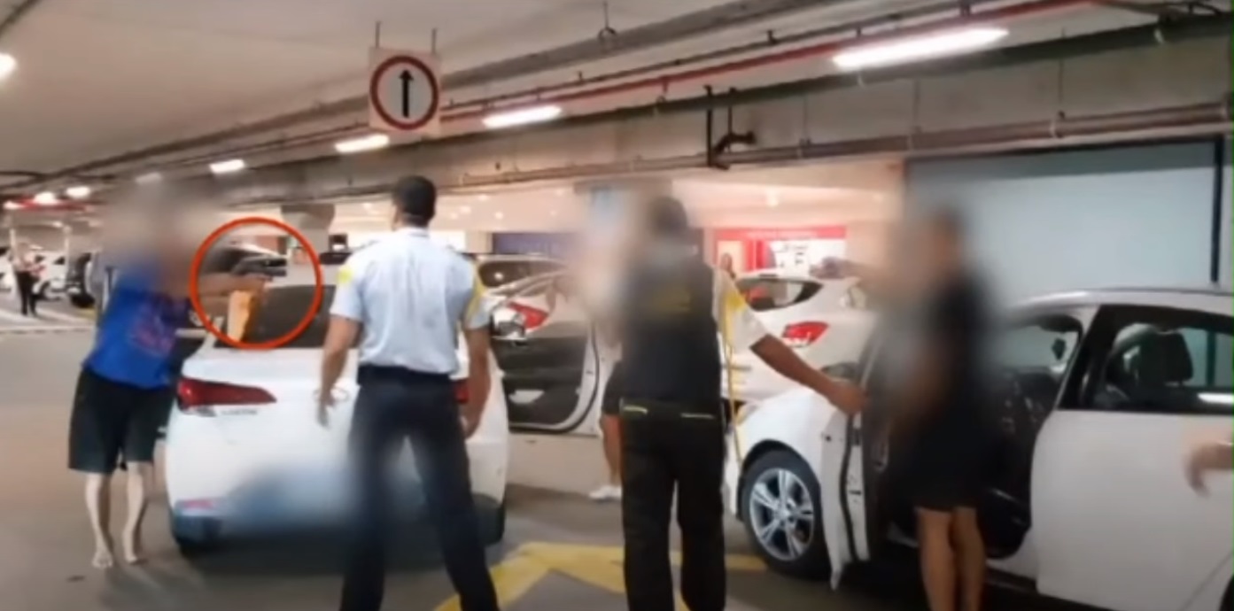 VÍDEO: Homem saca arma durante confusão no estacionamento do shopping Midway Mall